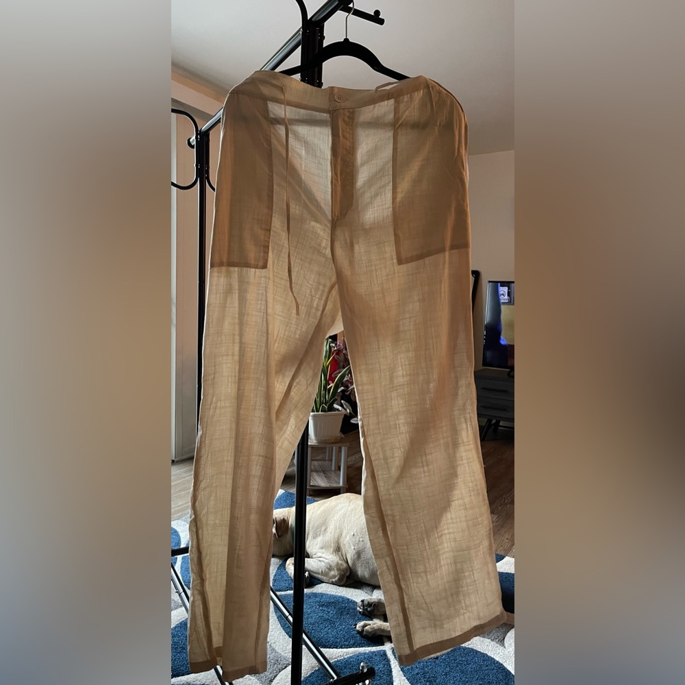 Beige Linen pants.